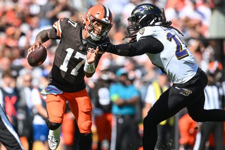 Cleveland's Dorian Thompson-Robinson avoids pressure from Jadeveon Clowney.