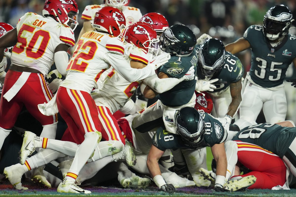 Jalen Hurts of the Eagles gets stopped short against the Chiefs.