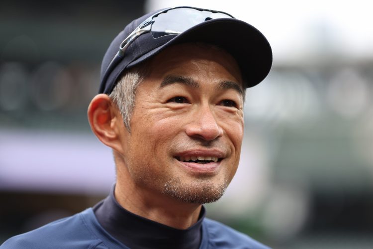 Ichiro Suzuki looks on before a Mariners game.