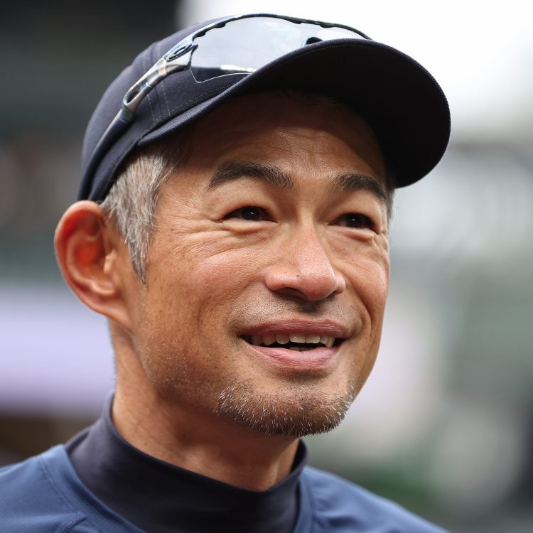 Ichiro Suzuki looks on before a Mariners game.