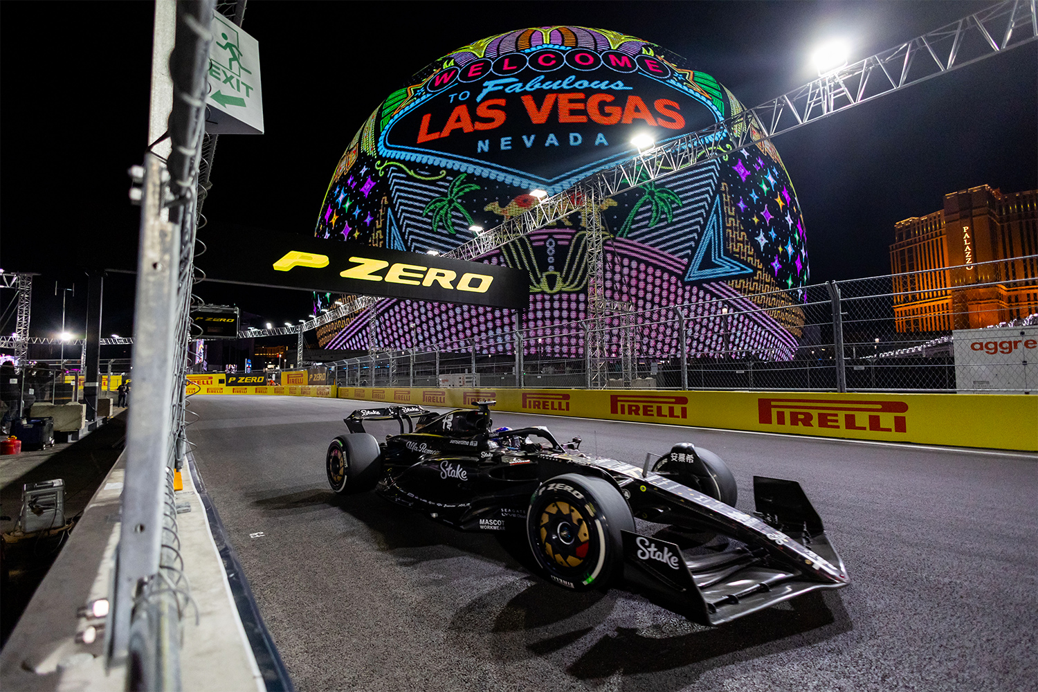 Alfa Romeo driver Valtteri Bottas (77) of Finland drives by the Sphere during the F1 Las Vegas Grand Prix on Saturday, November 18, 2023
