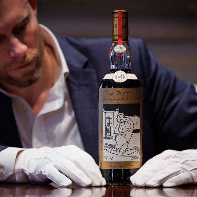 Jonny Fowle, Sotheby's global head of spirits, with The Macallan Adami 1926 at a recent auction.