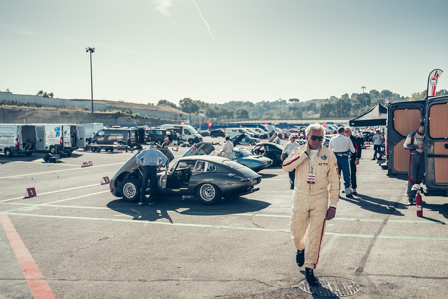 Participants in the Modena Cento Ore gather in a parking lot in Italy