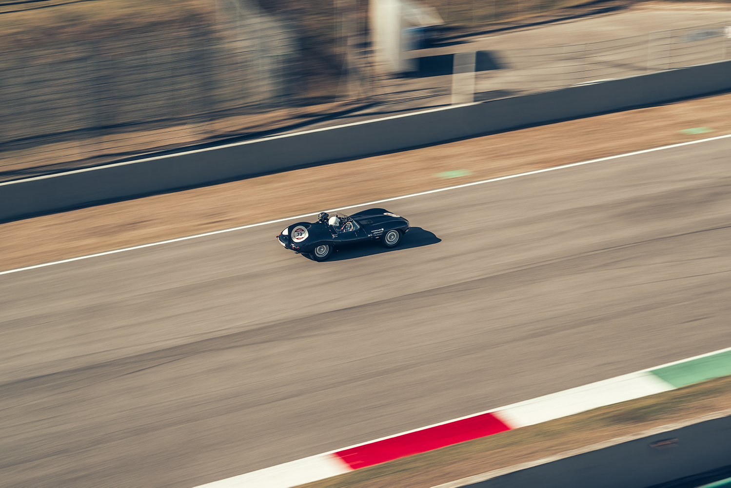 Jaguar D-type Continuation driving on an Italian racetrack