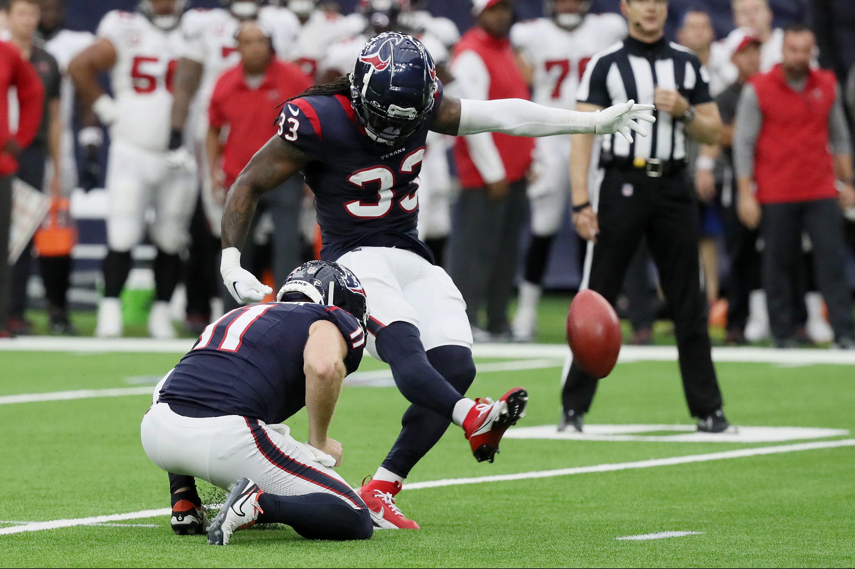 Dare Ogunbowale of the Texans kicks a field goal.
