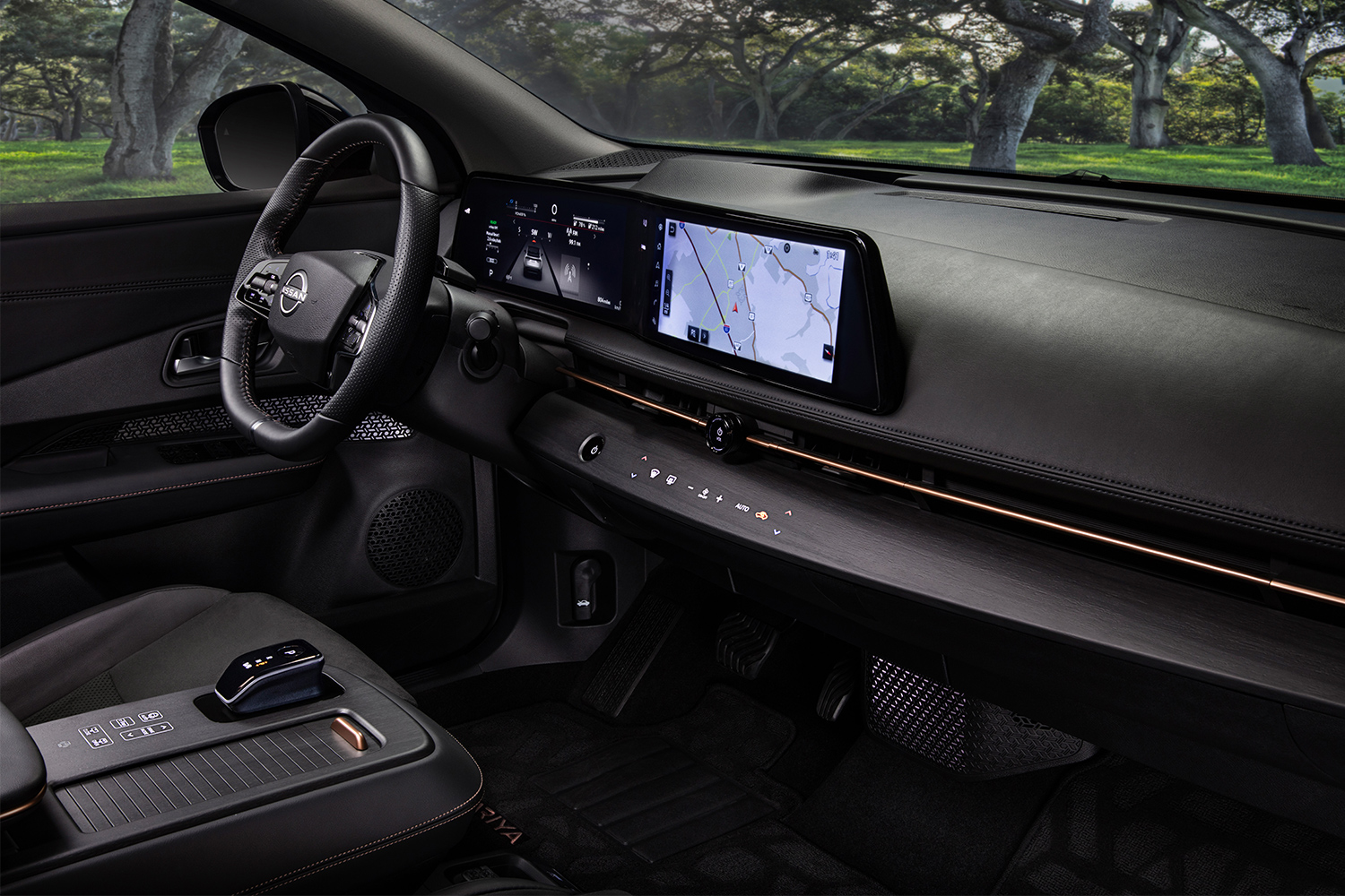 Dashboard screens and luxurious fabric choices in the Nissan Ariya