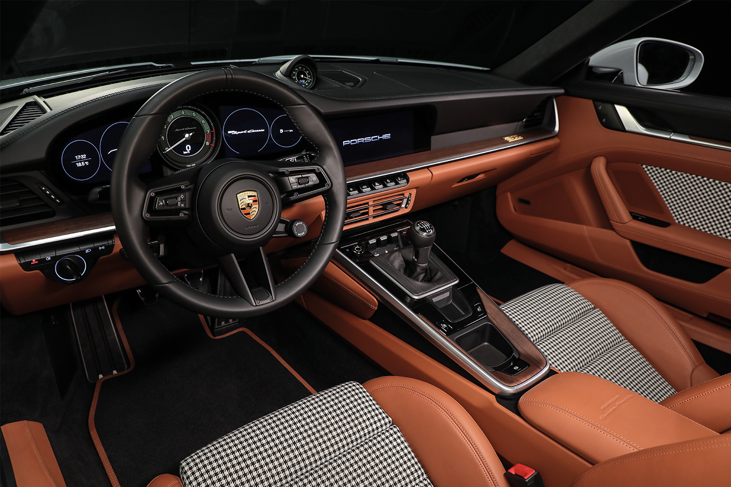The interior of the 2024 Porsche 911 Sport Classic, featuring houndstooth fabric
