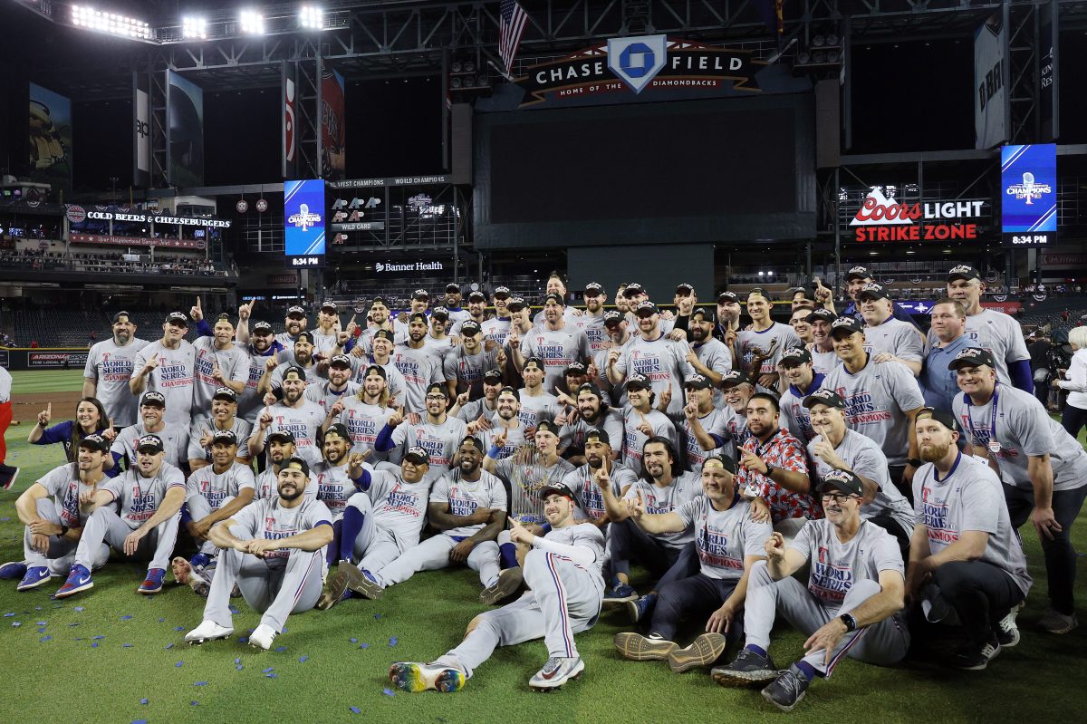 The Texas Rangers pose after beating the Arizona Diamondbacks in the 2023 World Series, which may end up being the least-watched World Series of all time