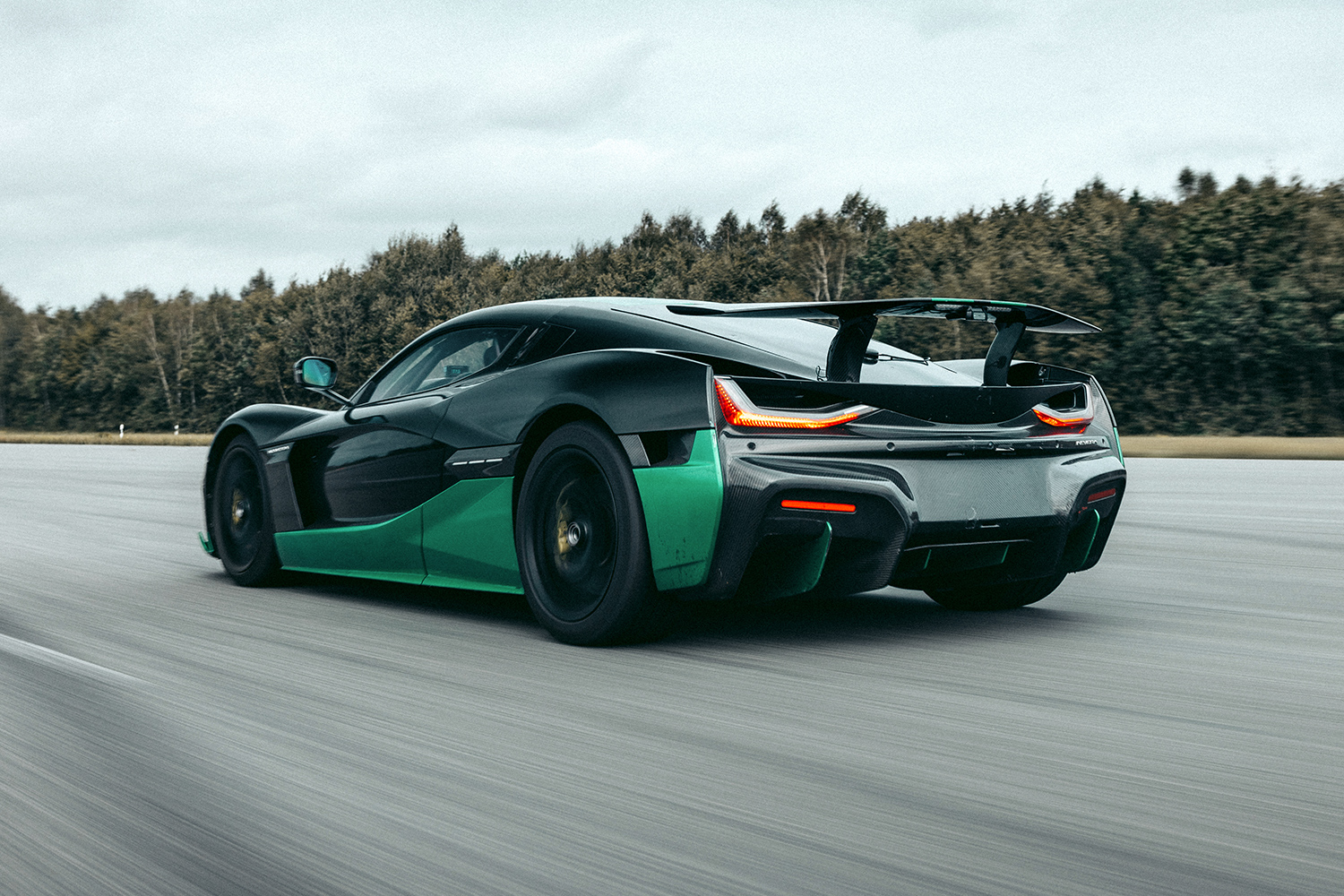 The Rimac Nevera, an electric hypercar from Croatia, breaking the Guinness World Record for fastest driving in reverse