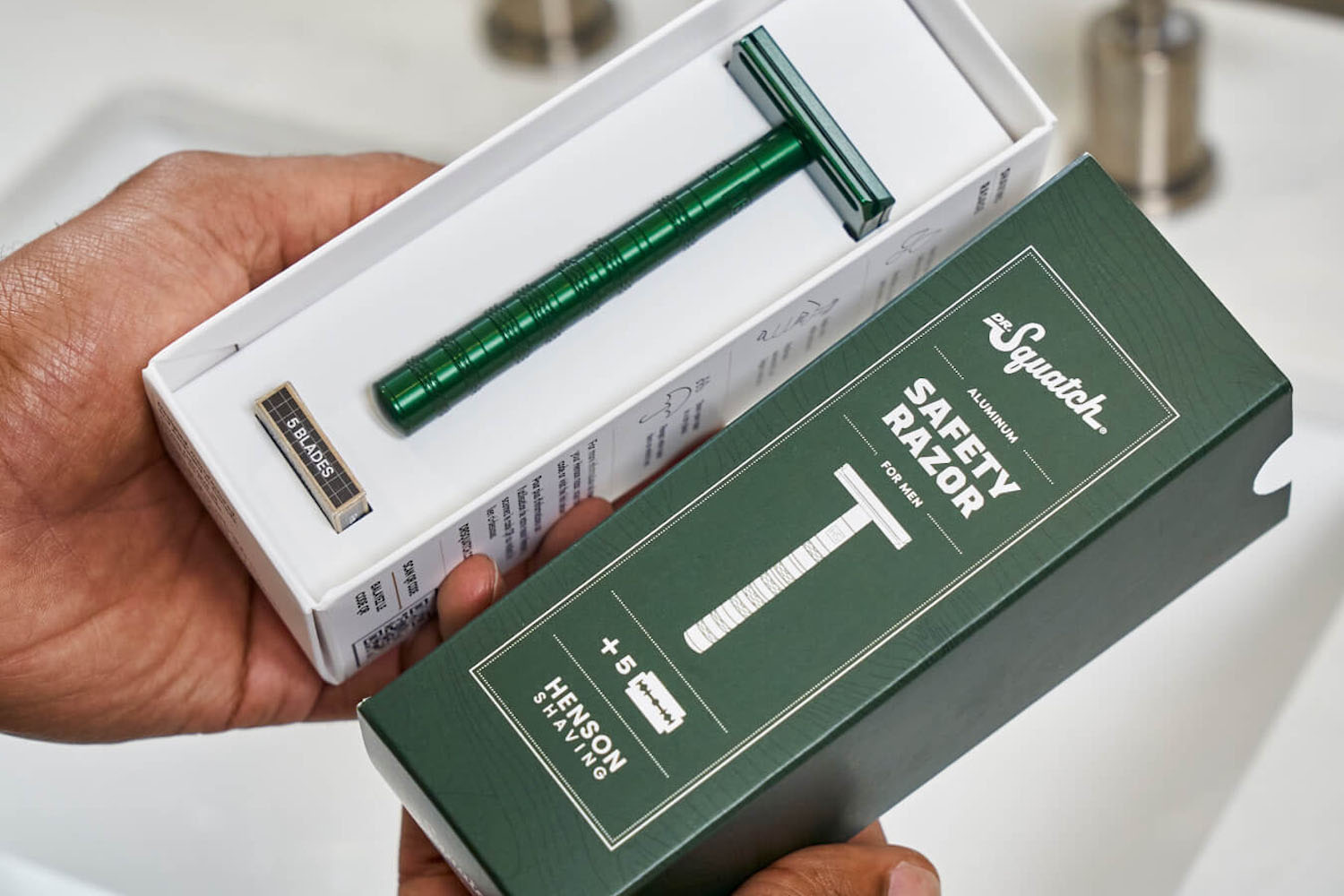 Dr Squach x Henson Safety Razor in someones hands