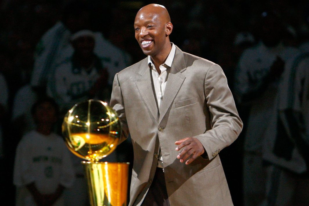 Sam Cassell posing with the championship trophy in 2008.