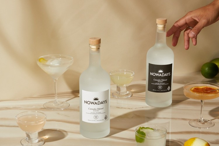 Bottles of Nowadays spirits with cocktails
