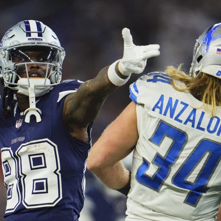 CeeDee Lamb of the Cowboys celebrates after a play against the Lions.