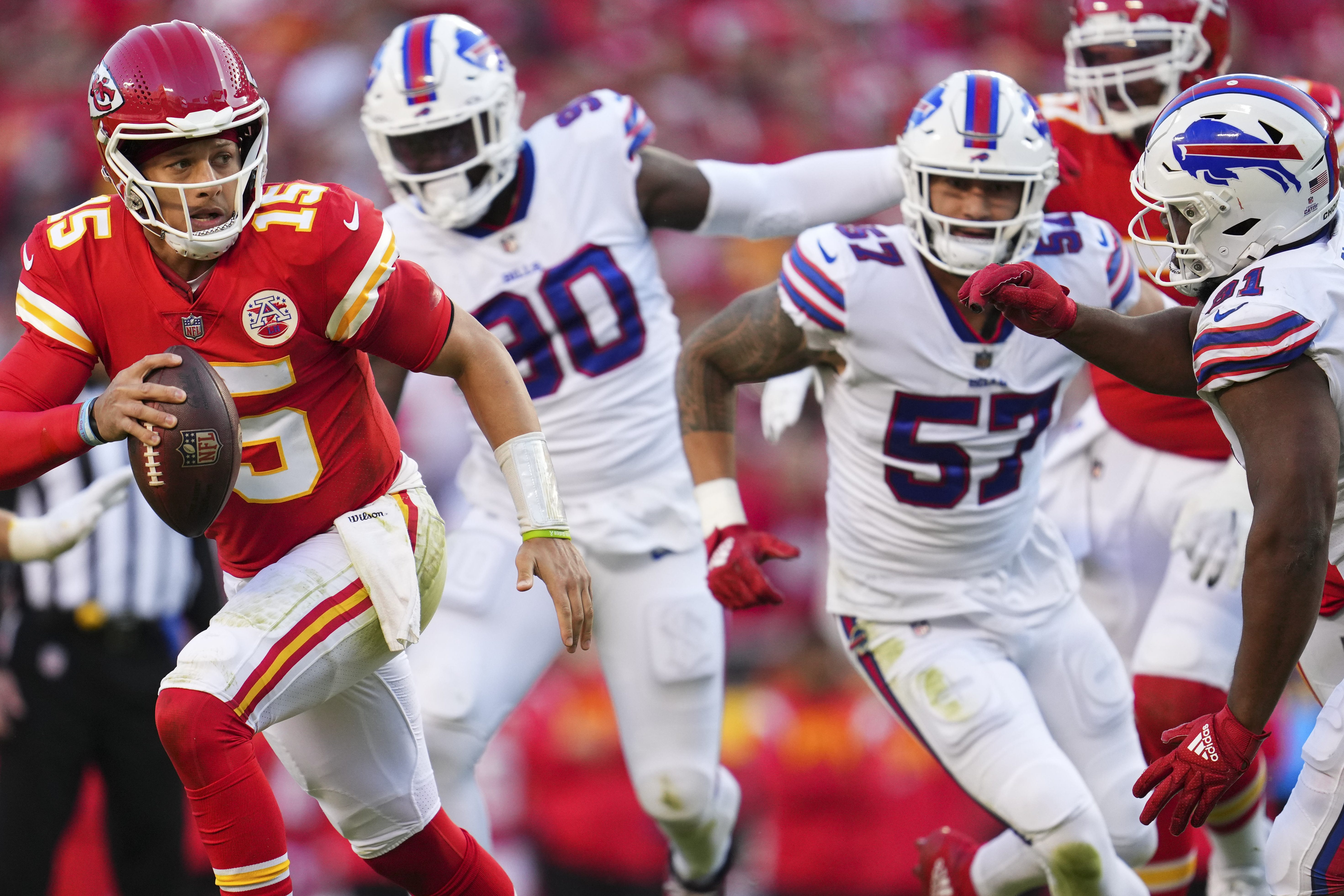 Patrick Mahomes scrambles against the Buffalo Bills.