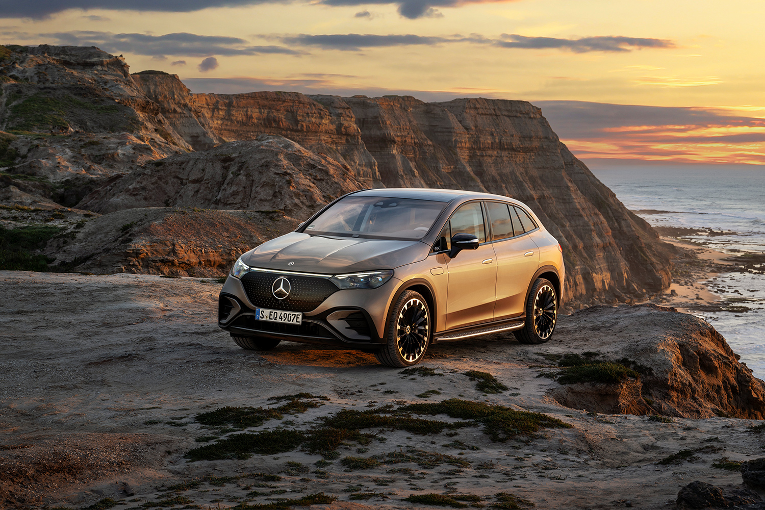 2023 Mercedes-Benz EQE 500 4MATIC SUV sitting on a cliff at sunset. We tested and reviewed the new electric SUV.