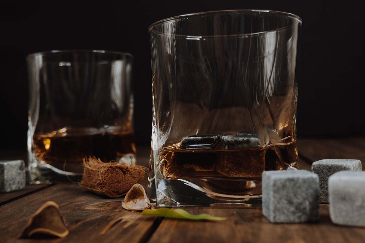 Two glasses of whisky with whisky stones, which are terrible for your drink
