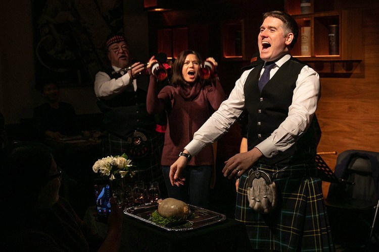 Andrew Weir (right) celebrating Burns Night with haggis