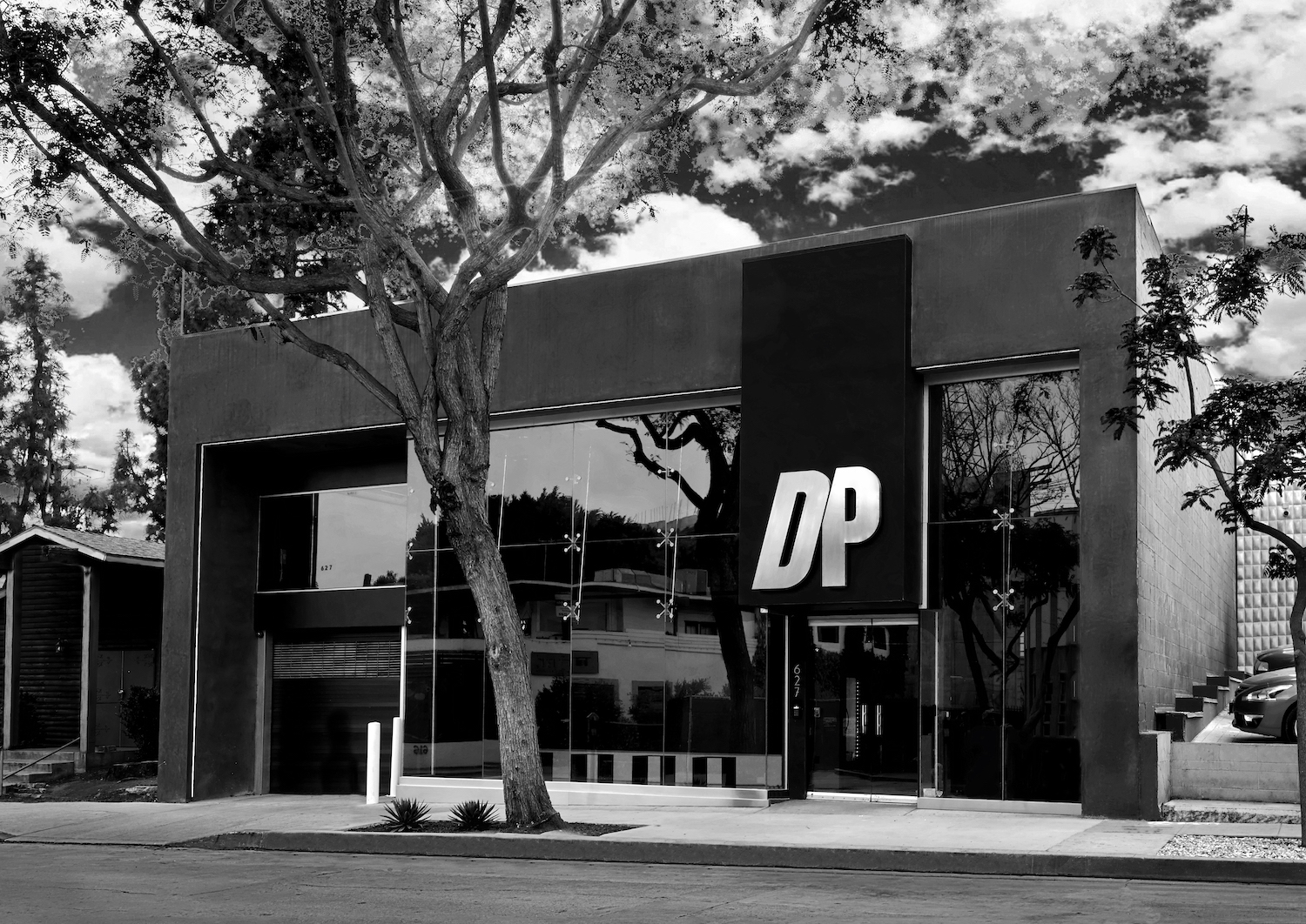 Exterior of Dogpound gym photographed in black and white 