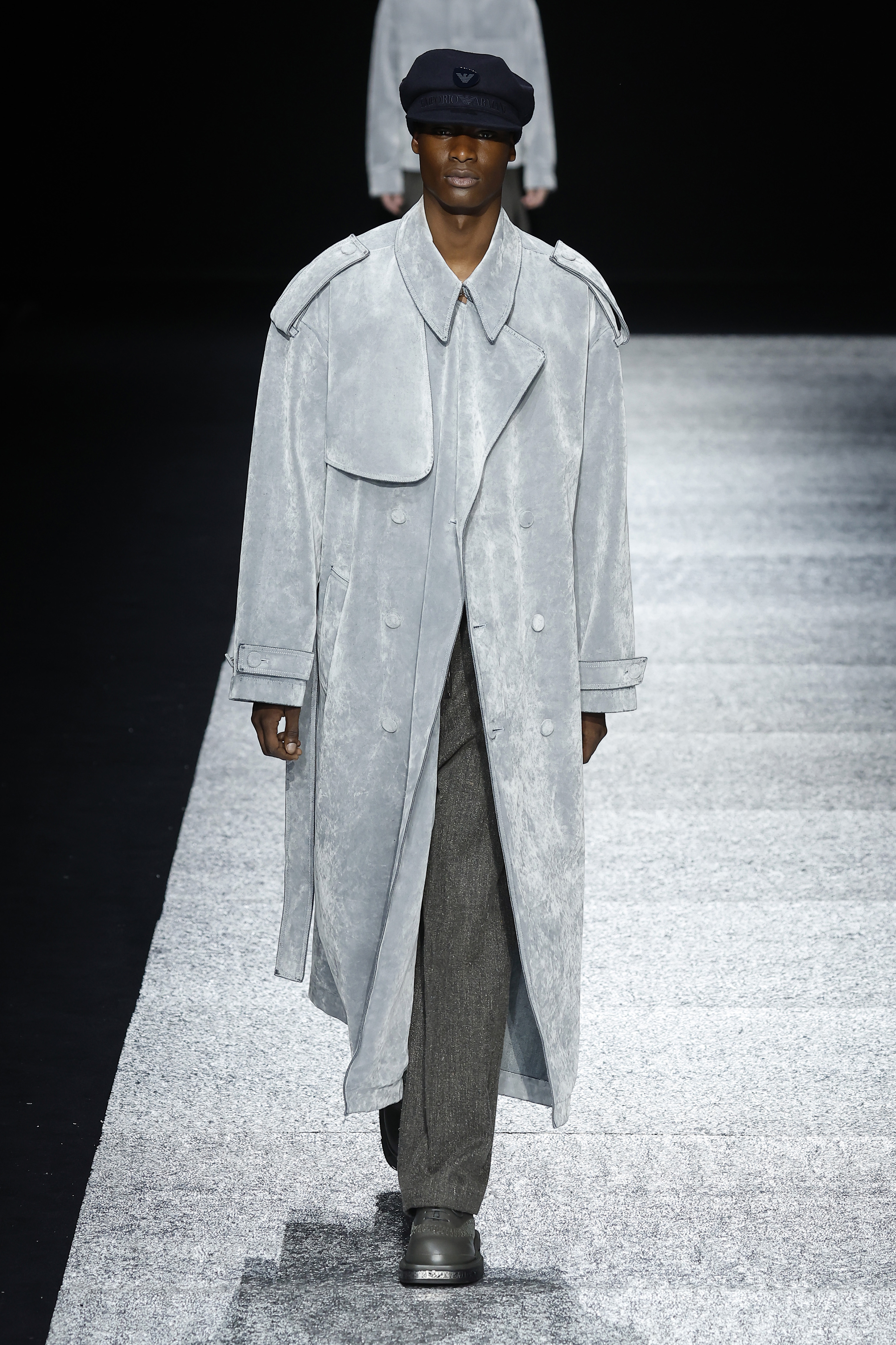 A model walks the runway at the Emporio Armani fashion show during the Milan Menswear Fall/Winter 2024-202