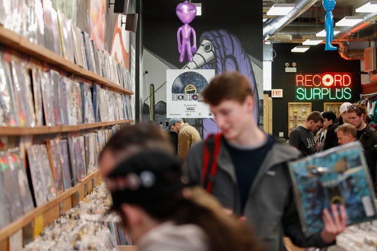 Customers shop at Shuga Records during Record Store Day in Chicago on April 13, 2019
