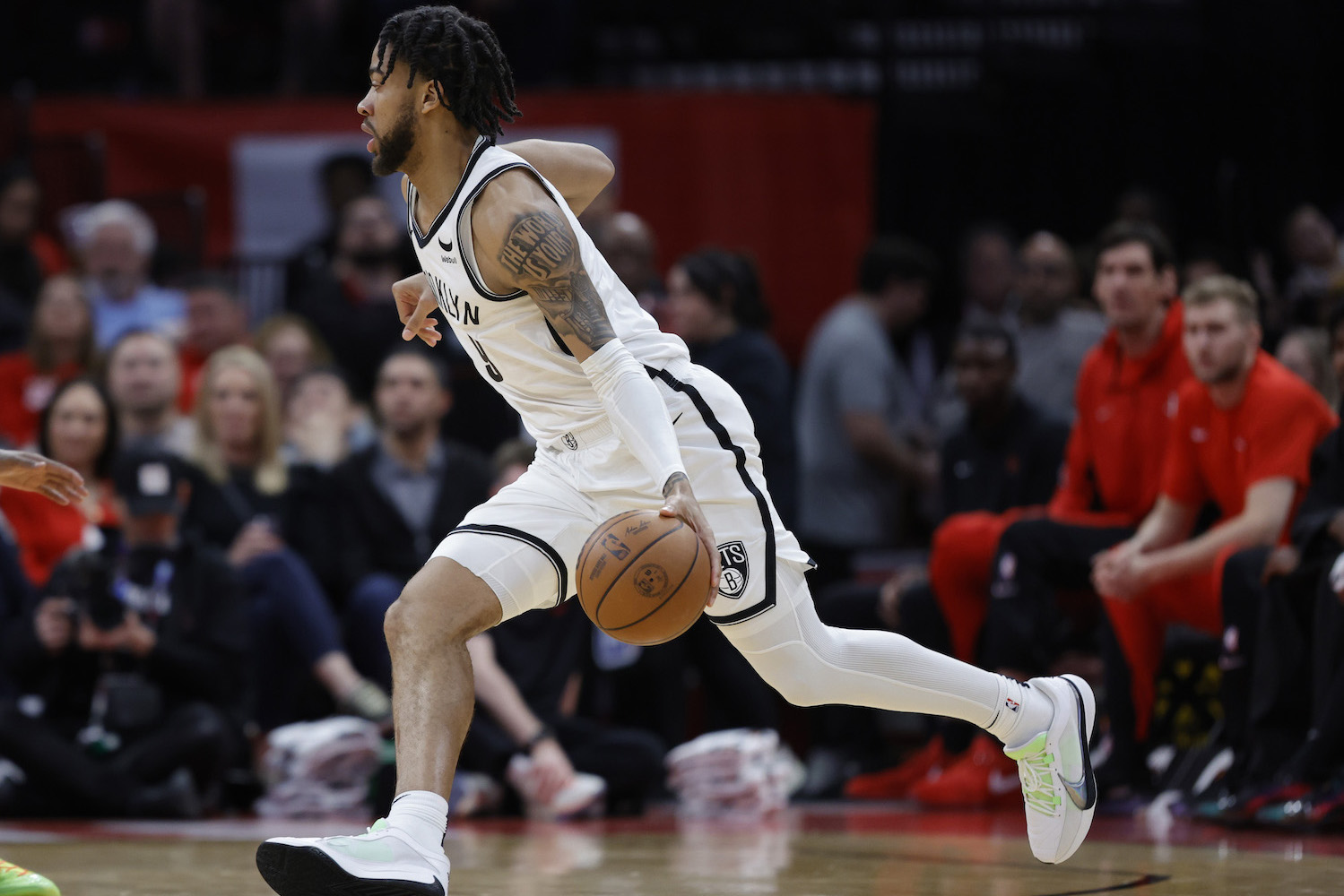 Trendon Watford #9 of the Brooklyn Nets drives with the ball against the Houston Rockets during the first half at Toyota Center