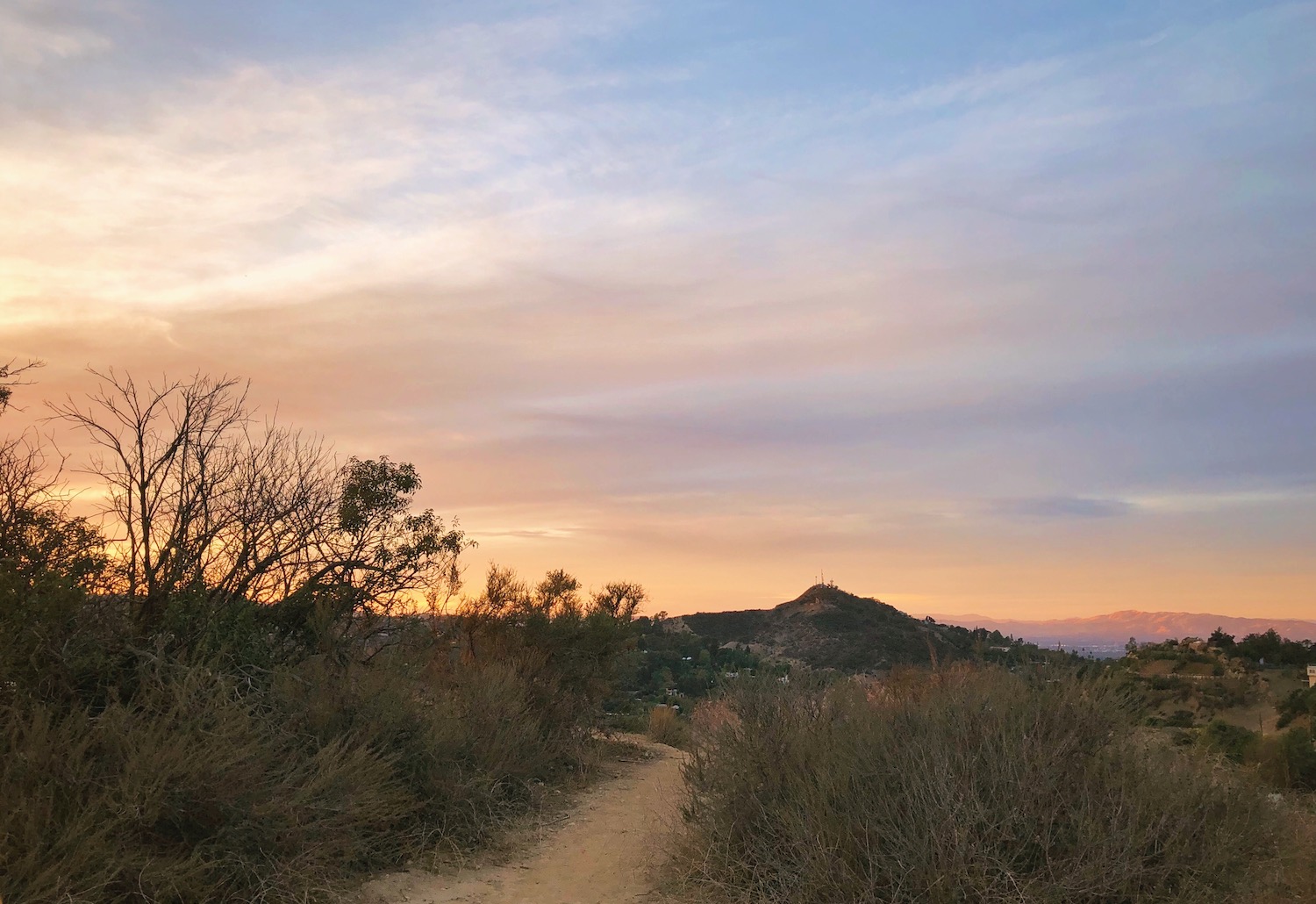 View of trail and sun setting from Runyon Canyon Park
