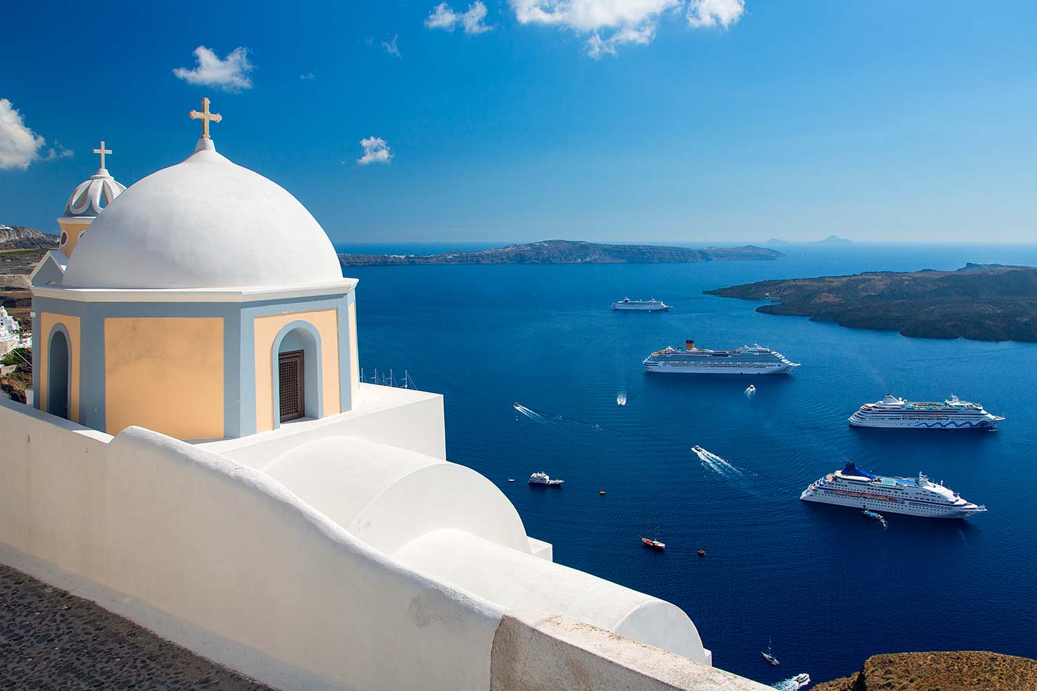 Santorini, Greece. This year, the country has introduced a new tourist tax called the "climate crisis resilience fee."