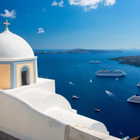 Santorini, Greece. This year, the country has introduced a new tourist tax called the "climate crisis resilience fee."
