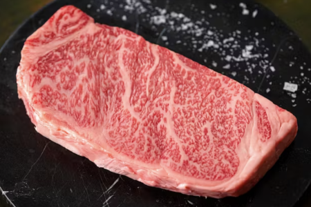 A Japanese A5 Olive Wagyu New York strip steak.
