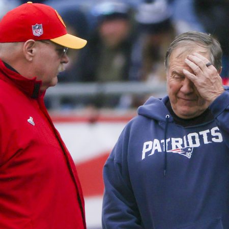 Bill Belichick and Andy Reid chat before a game.