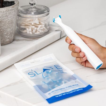 The Slate Electric Flosser, a flossing device we tested and reviewed