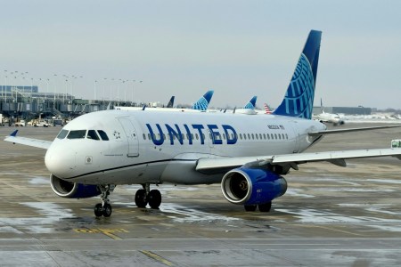 A United Airlines airplane taxiing at an airport. Here's how United and American Airlines are joining in on Taylor Swift-Super Bowl ever.