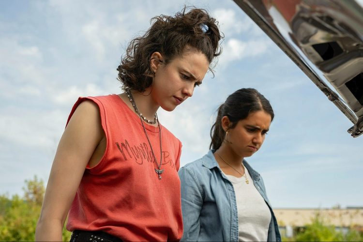Margaret Qualley and Geraldine Viswanathan in "Drive-Away Dolls"