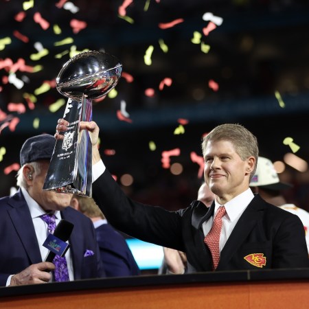 Kansas City Chiefs CEO Clark Hunt celebrates with the the Vince Lombardi Trophy after his team defeated the Philadelphia Eagles 38-35 in Super Bowl LVII at State Farm Stadium on February 12, 2023 in Glendale, Arizona.