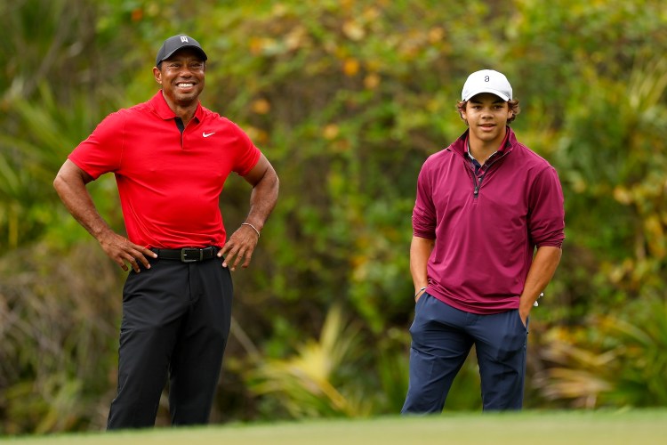 ORLANDO, FLORIDA - DECEMBER 17: Tiger Woods and Charlie Woods of the United States during the final round of the PNC Championship at The Ritz-Carlton Golf Club on December 17, 2023 in Orlando, Florida. (Photo by Mike Ehrmann/Getty Images)