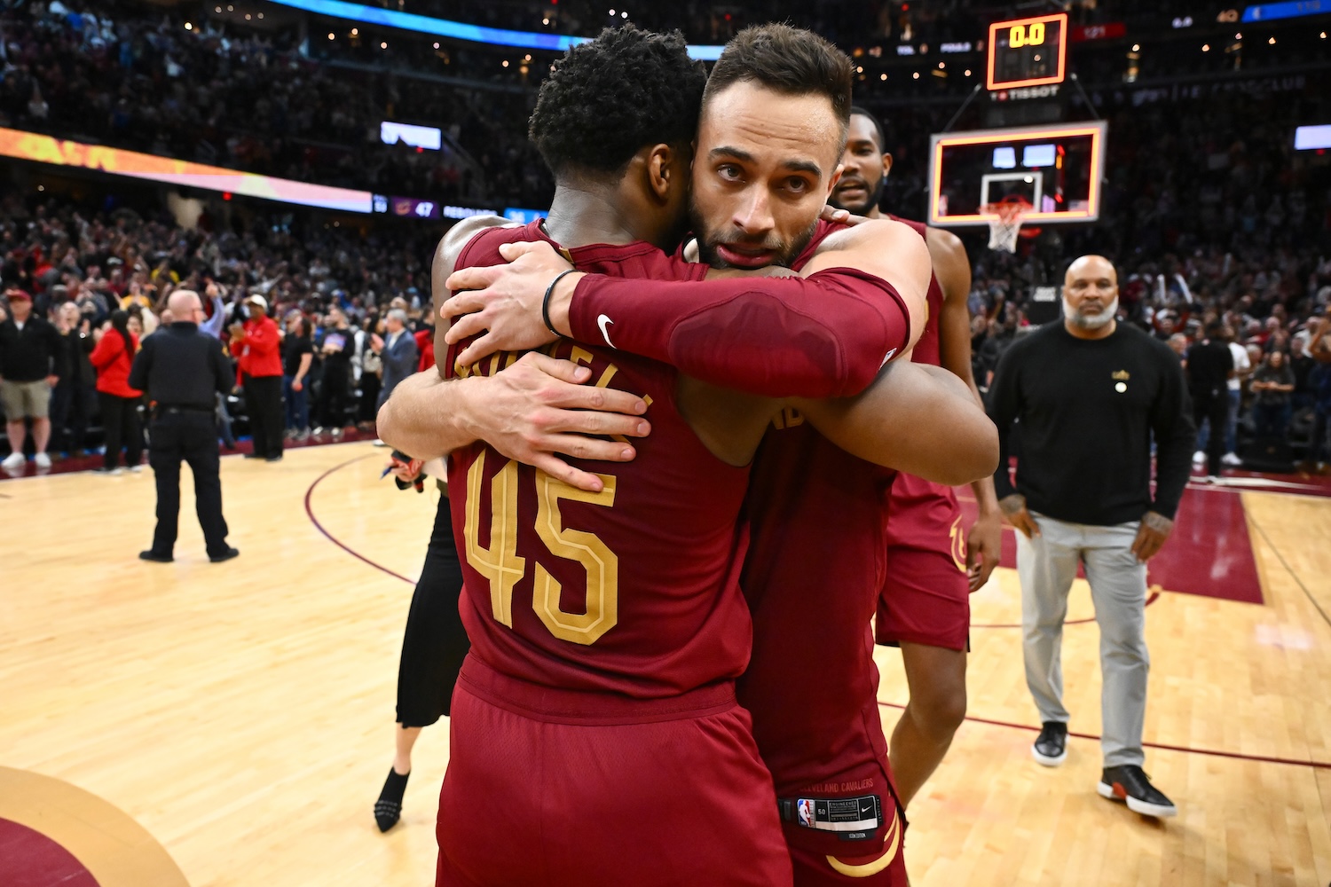 Donovan Mitchell #45 of the Cleveland Cavaliers congratulates teammate Max Strus #1 after Strus made a half-court buzzer-beater to defeat the Dallas Mavericks at Rocket Mortgage Fieldhouse on February 27, 2024 in Cleveland, Ohio. The Cavaliers defeated the Mavericks 121-119. (Photo by Jason Miller/Getty Images)