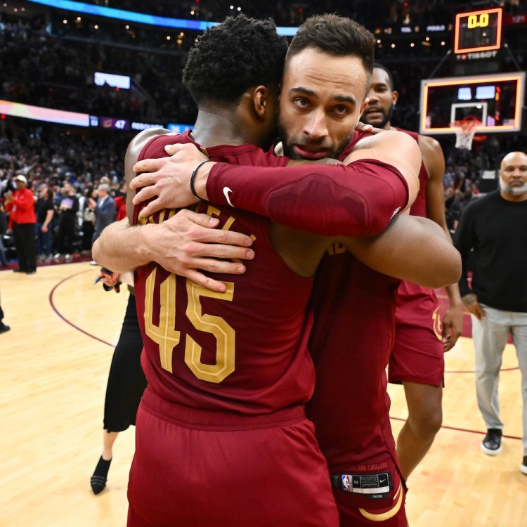 Donovan Mitchell #45 of the Cleveland Cavaliers congratulates teammate Max Strus #1 after Strus made a half-court buzzer-beater to defeat the Dallas Mavericks at Rocket Mortgage Fieldhouse on February 27, 2024 in Cleveland, Ohio. The Cavaliers defeated the Mavericks 121-119. (Photo by Jason Miller/Getty Images)