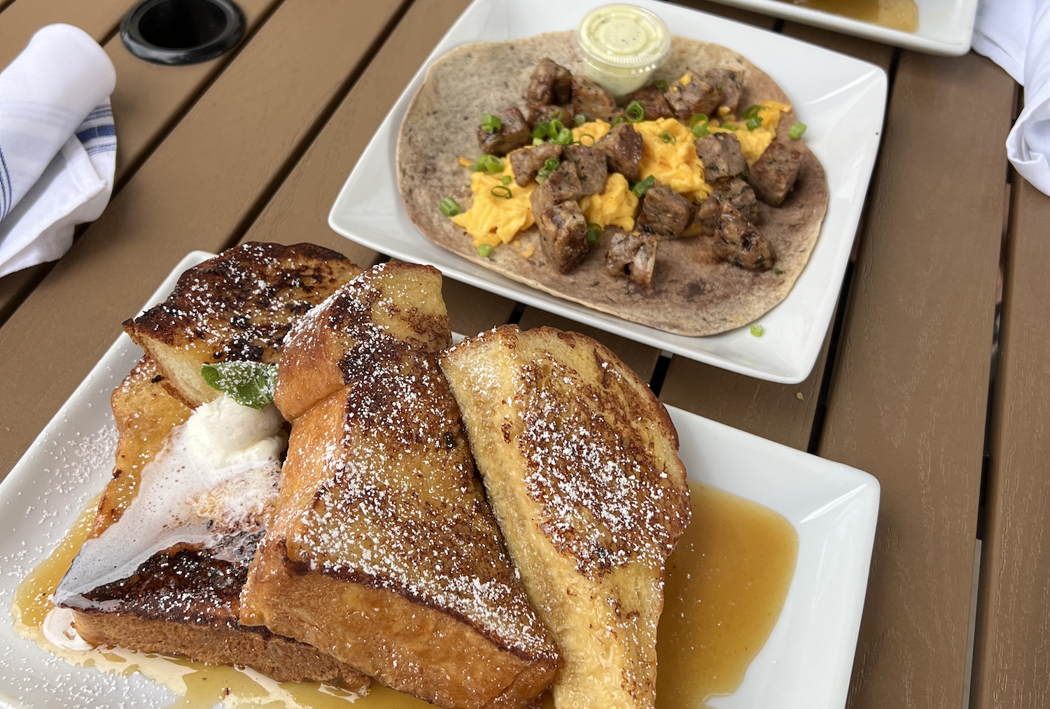 French toast and breakfast taco opened on a plate