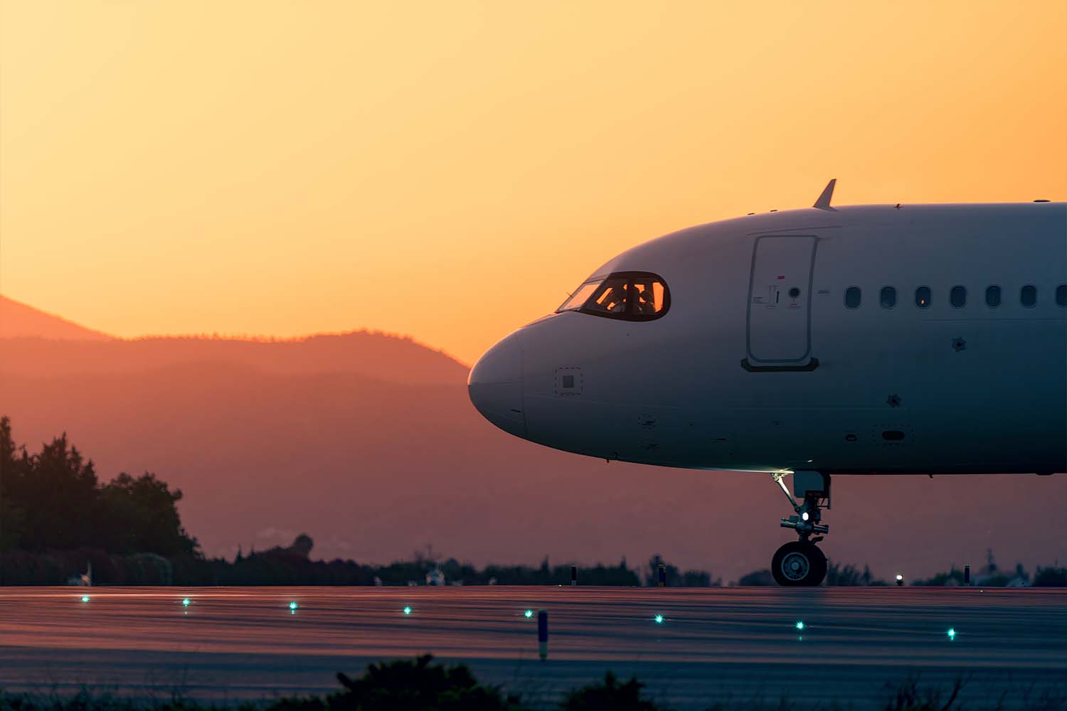 An airplane taxiing on a runway