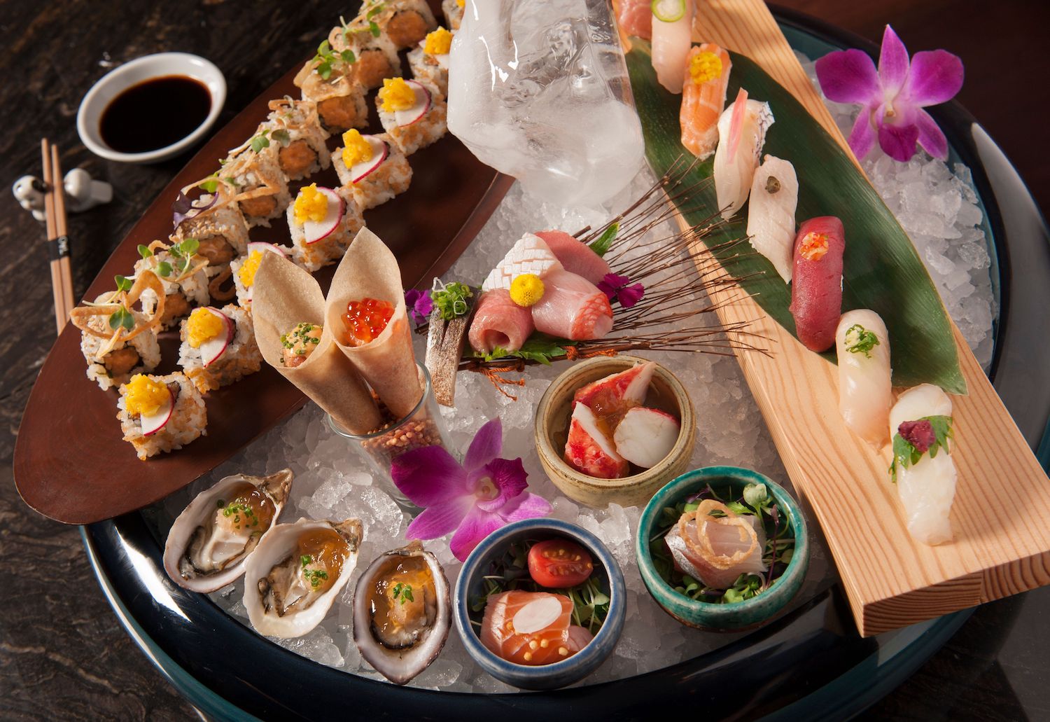 Spread of decorative sushi on ice