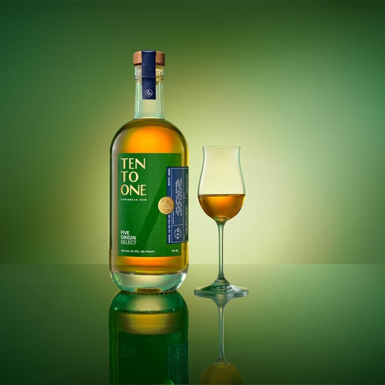 A bottle of Ten to One Five Origin Select, a new sipping rum (with a glass of rum poured neat)