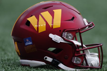 A Washington Commanders helmet on the field.