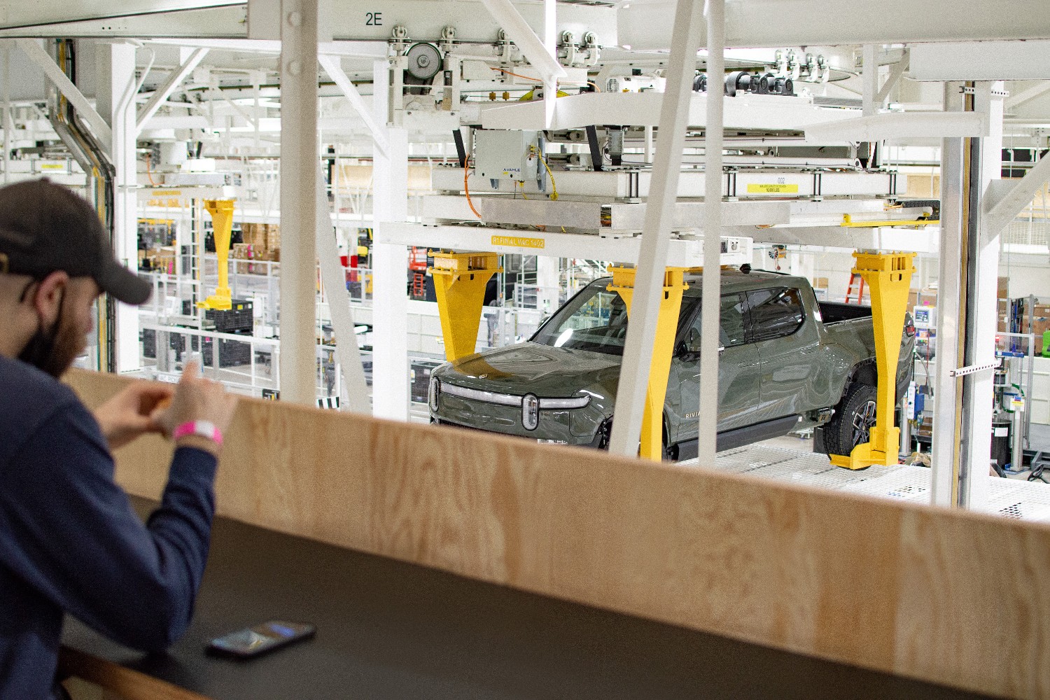 A Rivian plant with an R1T electric truck. The EV maker set a date for unveiling its new R2 model.