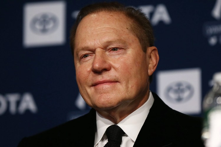 Super agent Scott Boras looks on during a New York Yankees press conference. Four of his clients are MLB free agents holding out for more money as spring training begins.