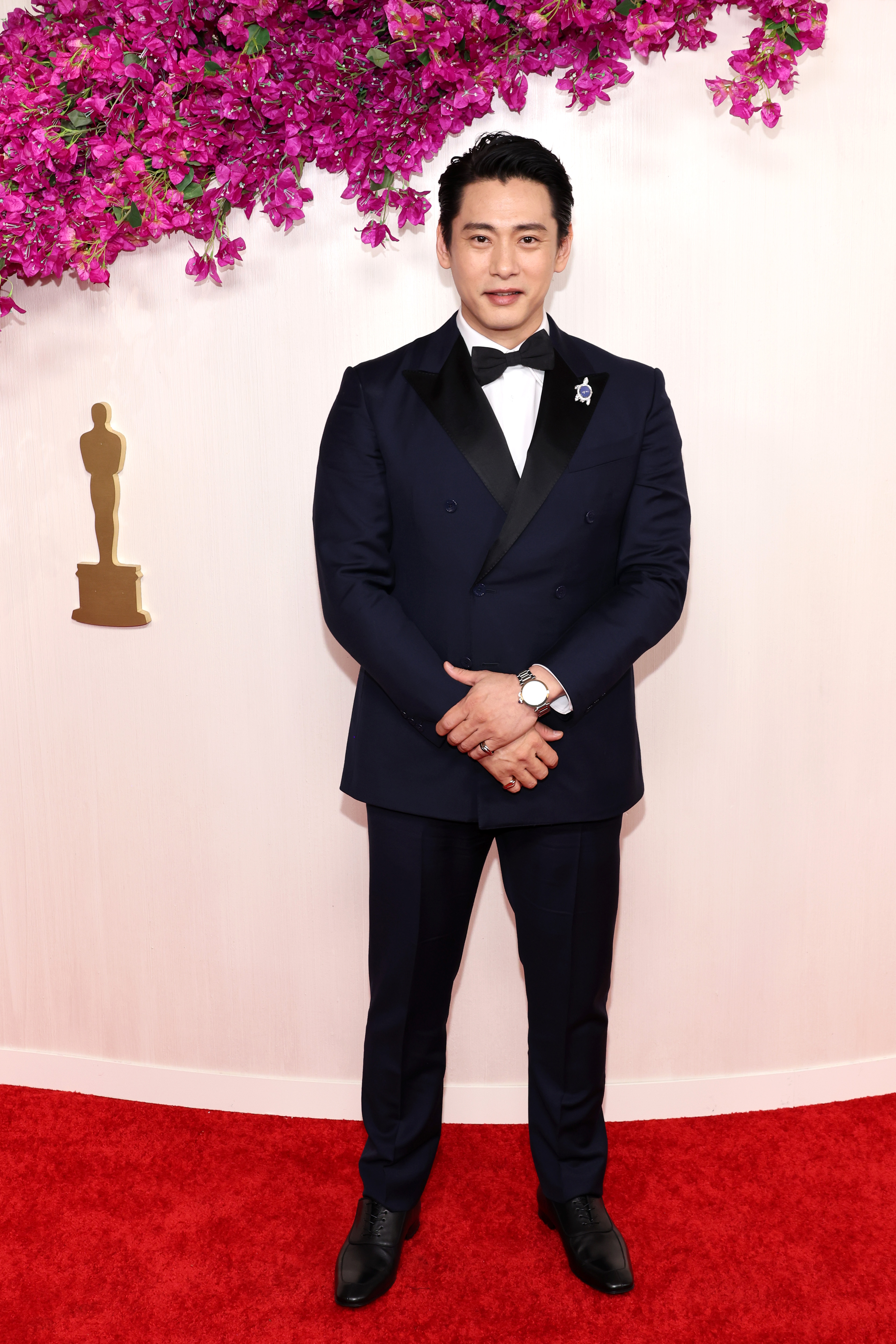 Teo Yoo attends the 96th Annual Academy Awards