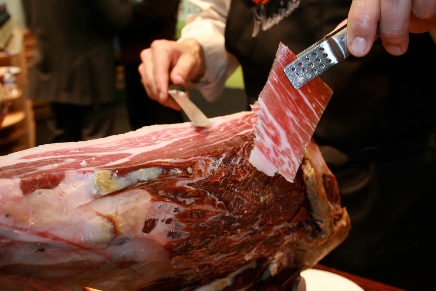 A leg of ham clamped in a jamonero holder
