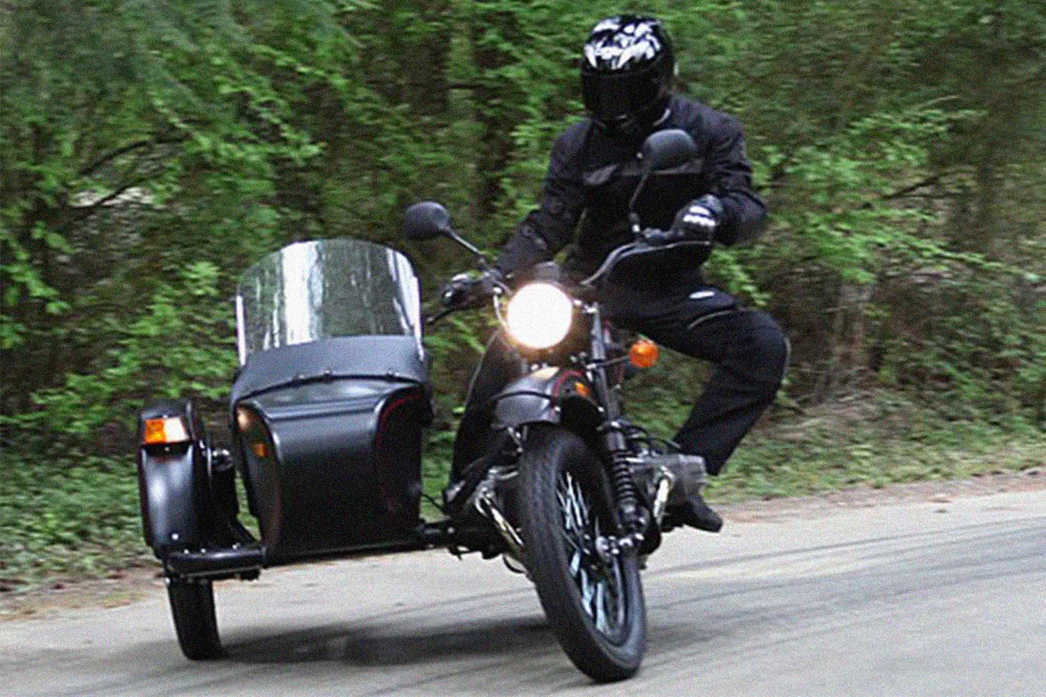 Automotive expert Basem Wasef on a Ural T sidecar motorcycle in 2009