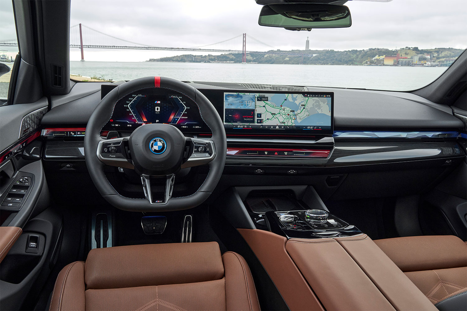 The interior of the BMW i5 M60, showing the dashboard and center console