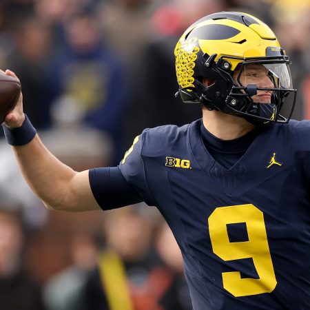 Michigan's J.J. McCarthy throws the ball against the Ohio State Buckeyes. He's now expected by some to be the No. 2 overall pick at the NFL Draft in April.