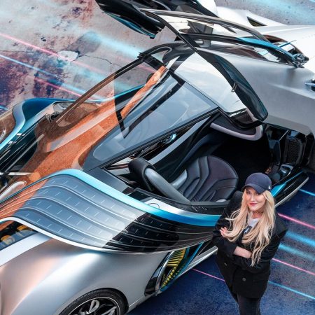 Alex Hirschi, better known online as automotive influencer Supercar Blondie, standing next to the Hyperion XP-1 prototype that will be sold on her new SBX Cars auction site